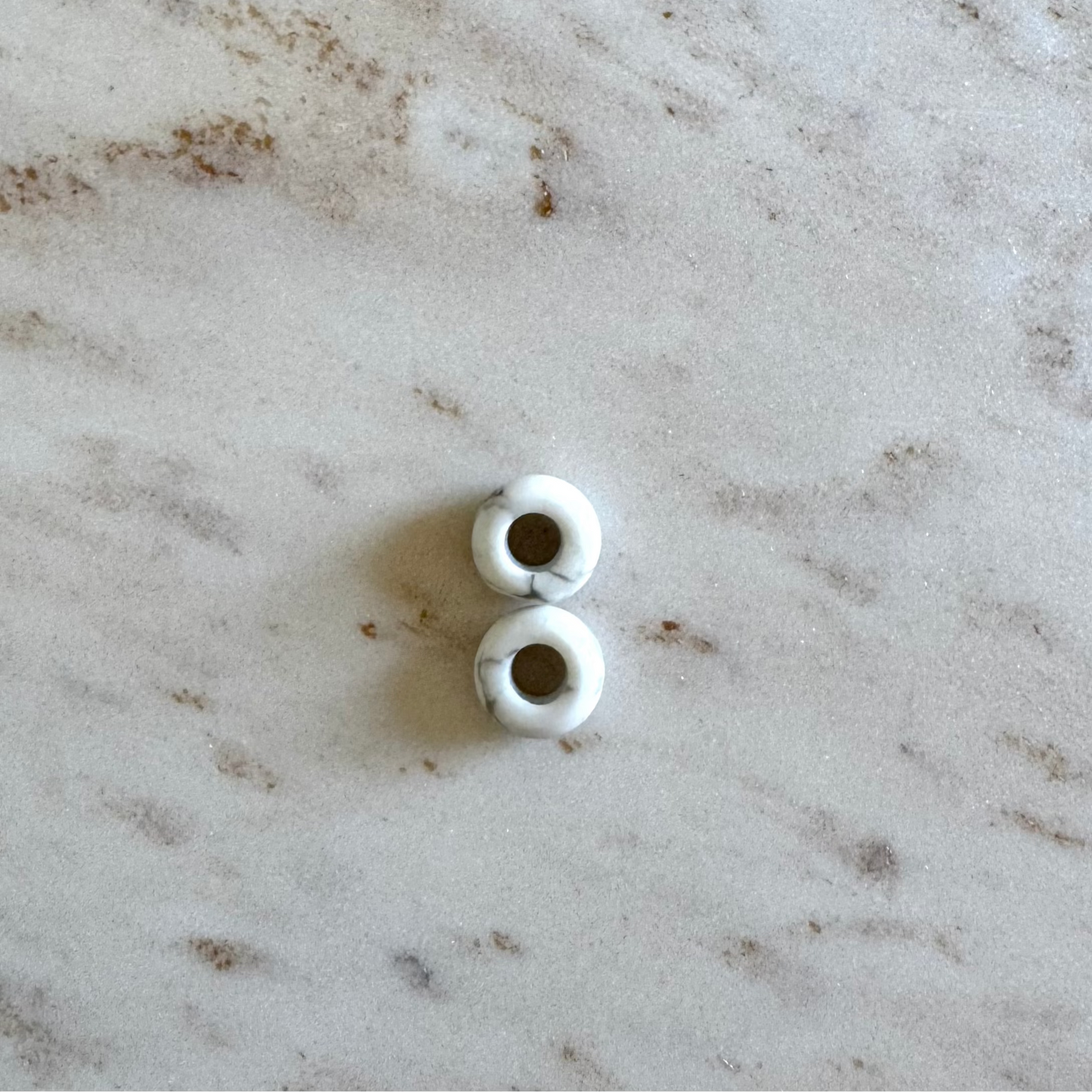 2 white howlith donut shape pendants