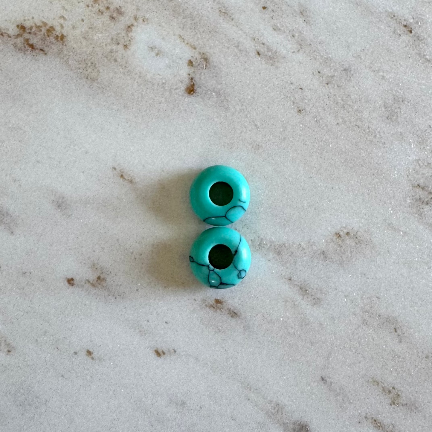 2 turquoise donut shape pendants