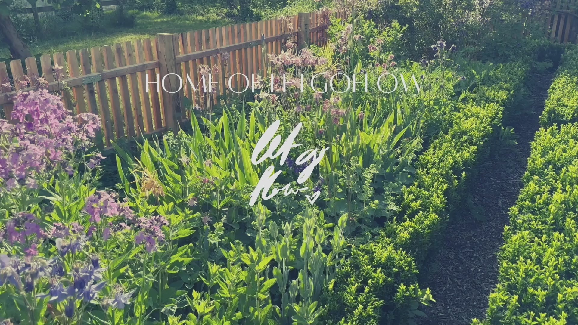 Load video: Showing the beautiful garden where we get our herbs from. Manifestation Candles in the making.